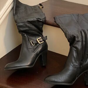Black leather tall boots with heel